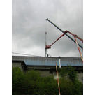 Installation de structure métallique sur toit